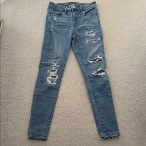 light washed jeans with rips